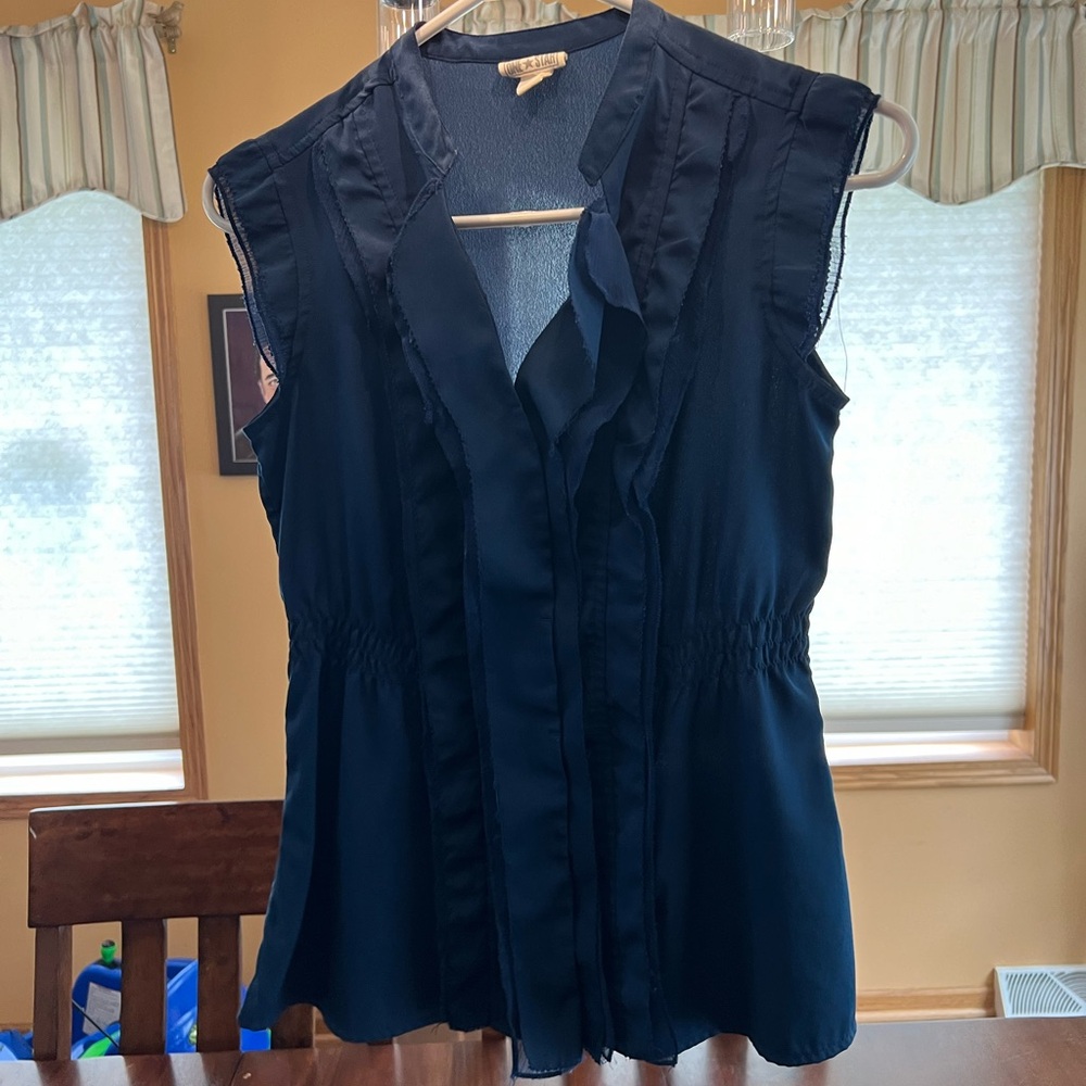 Navy sleeveless top with sheer details